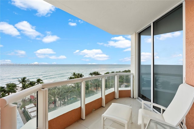 balcony featuring a water view