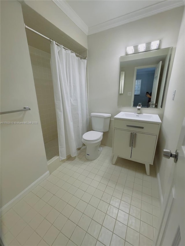 bathroom featuring vanity, a tile shower, ornamental molding, tile patterned floors, and toilet