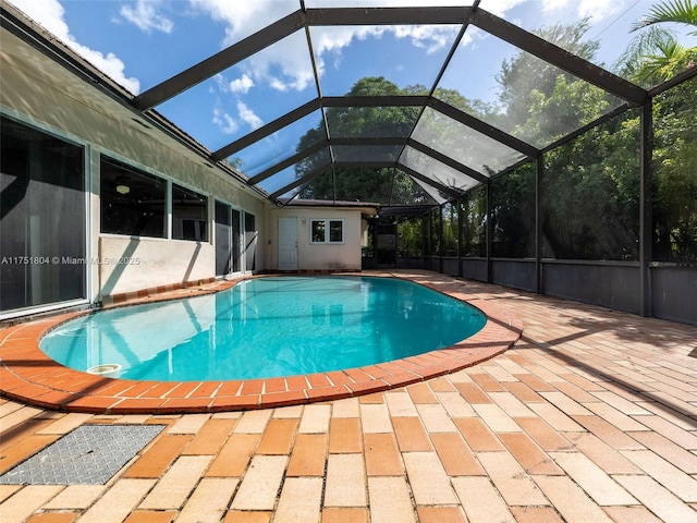 outdoor pool featuring a patio