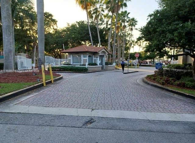 view of street featuring curbs and traffic signs