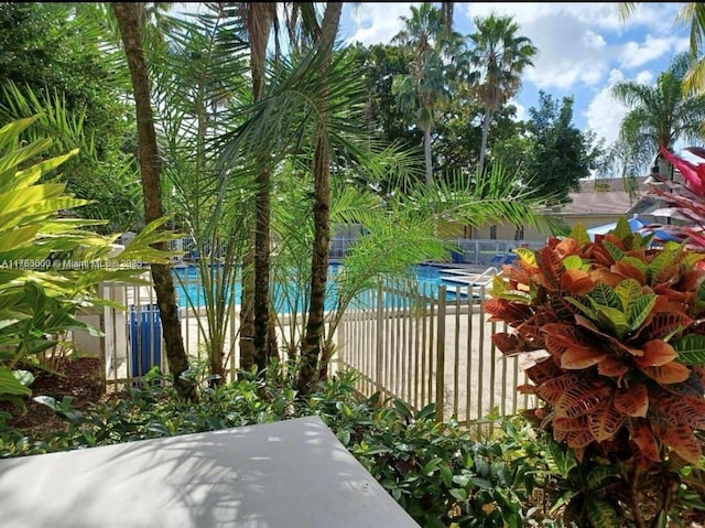 view of yard with fence