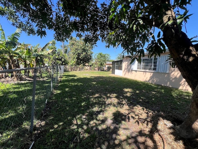 view of yard with fence