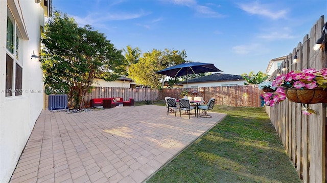 view of patio featuring a fenced backyard and an outdoor hangout area