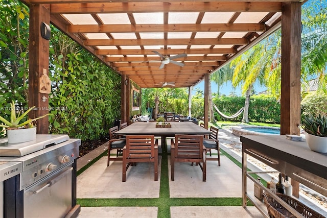 view of patio / terrace featuring area for grilling, outdoor dining area, a ceiling fan, and grilling area