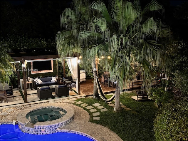 view of yard with a patio area, an outdoor pool, an outdoor living space, and an in ground hot tub