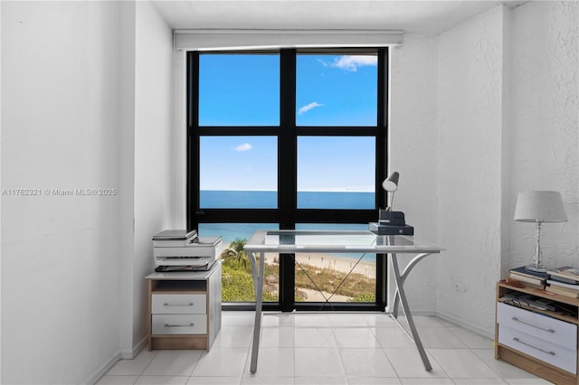1111 Crandon Blvd Unit B506, Key Biscayne, FL 33149 - office area with baseboards, a textured wall, and light tile patterned floors