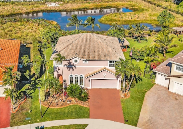 drone / aerial view featuring a water view