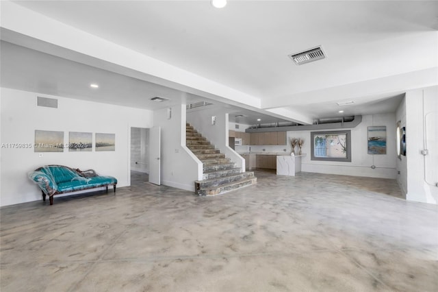 interior space featuring visible vents, recessed lighting, and stairs