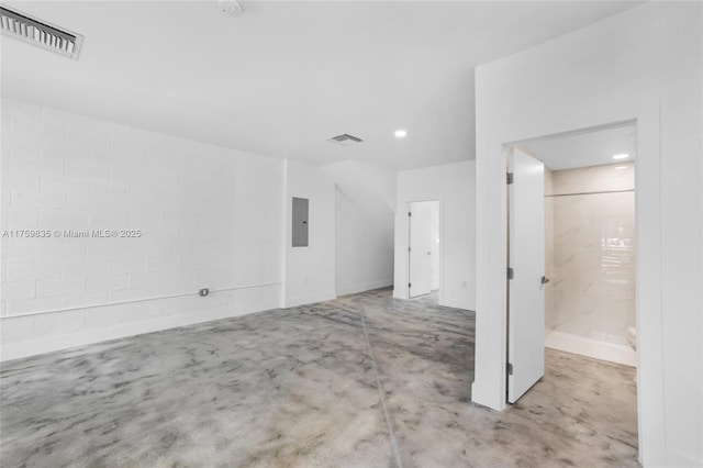 interior space featuring electric panel, visible vents, and recessed lighting