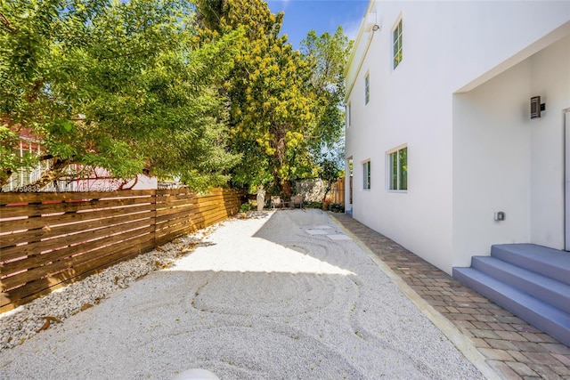 view of patio / terrace featuring fence