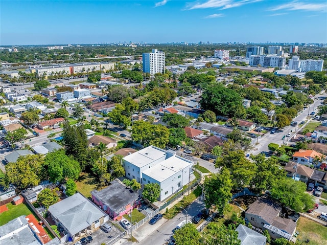 birds eye view of property with a view of city