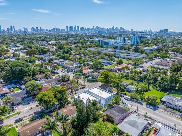 birds eye view of property with a view of city