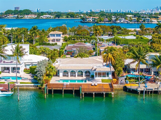 1690 Daytonia Rd, Miami Beach, FL 33141 - aerial view of a pool area, a large body of water, and city skyline