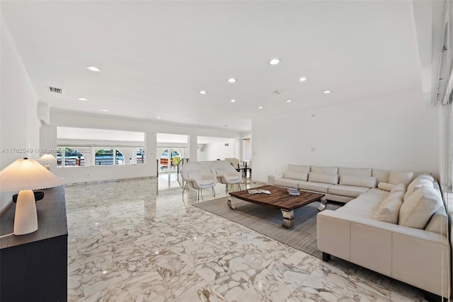 1690 Daytonia Rd, Miami Beach, FL 33141 - living area with marble tiled floors and recessed lighting