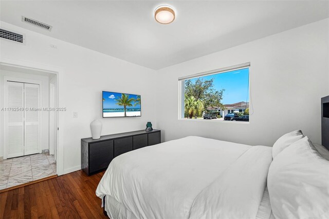1690 Daytonia Rd, Miami Beach, FL 33141 - bedroom with wood finished floors and baseboards