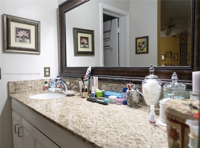 bathroom featuring vanity and a ceiling fan