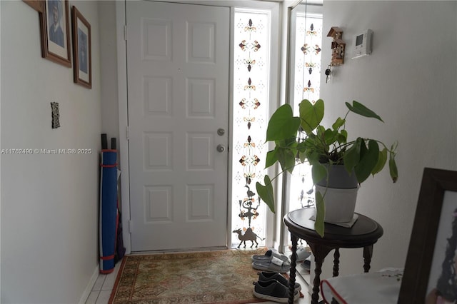 view of tiled foyer entrance