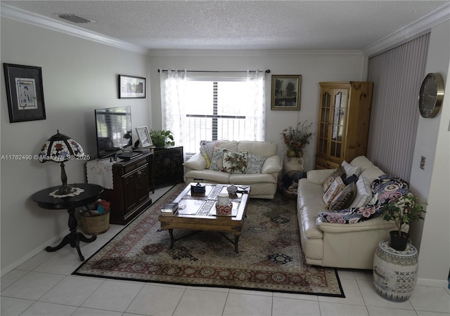 tiled living area featuring visible vents, a textured ceiling, crown molding, and baseboards