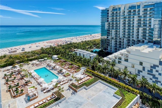 drone / aerial view with a view of the beach and a water view