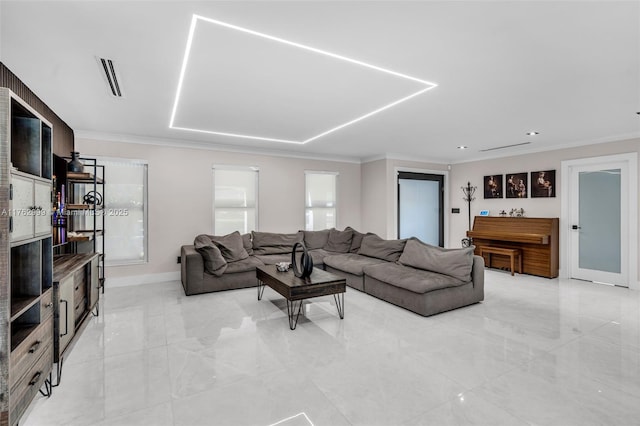 living room featuring visible vents, baseboards, and ornamental molding