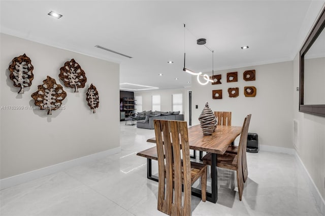 dining room featuring recessed lighting, visible vents, baseboards, and ornamental molding