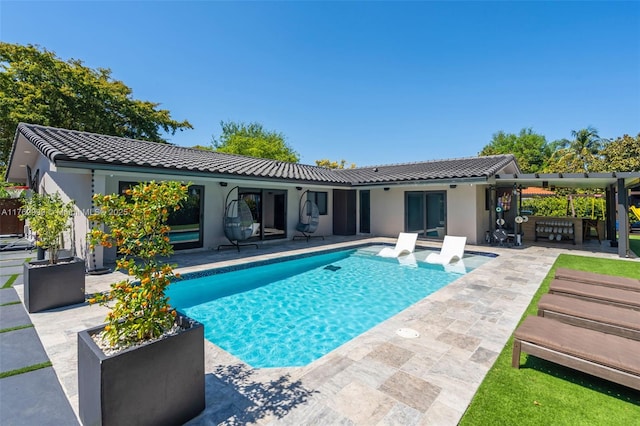 outdoor pool with a patio