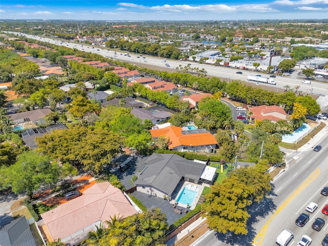 birds eye view of property with a residential view