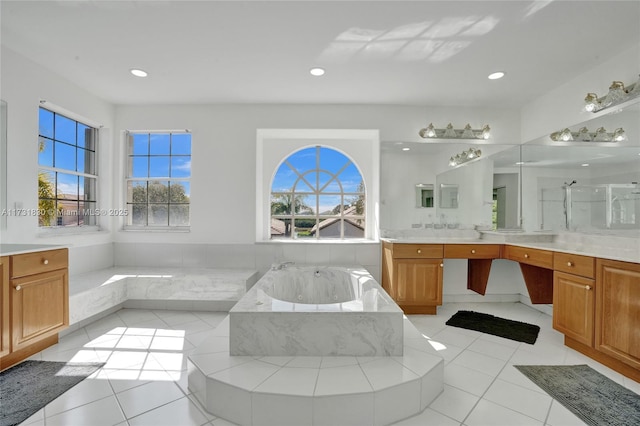 bathroom featuring tile patterned floors, recessed lighting, a shower, a bath, and vanity