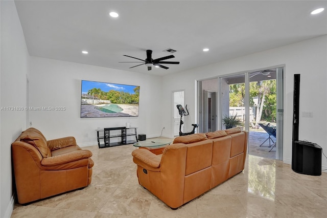 living area with recessed lighting, visible vents, baseboards, and ceiling fan