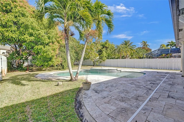 view of swimming pool featuring a patio area, a lawn, a fenced backyard, and a fenced in pool