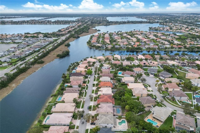 aerial view featuring a water view and a residential view