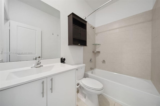 bathroom featuring bathtub / shower combination, tile patterned floors, toilet, and vanity