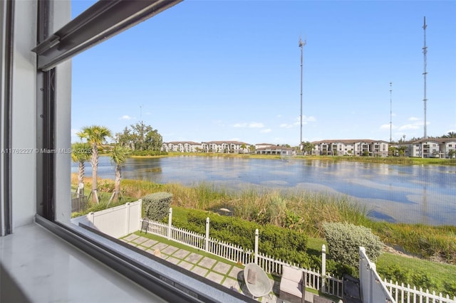 view of water feature with fence