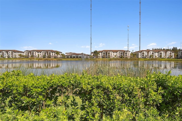 view of water feature with a residential view