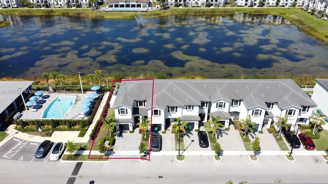 aerial view featuring a residential view and a water view