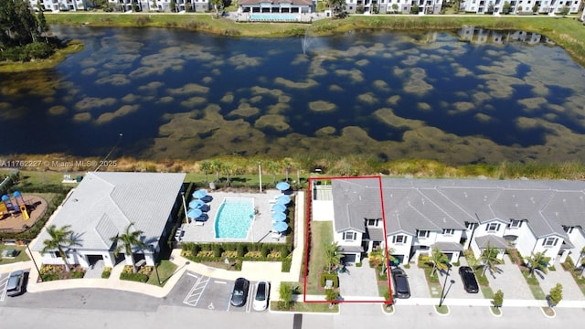 aerial view featuring a residential view and a water view