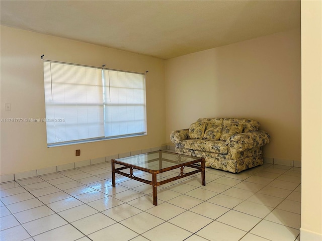 living area with light tile patterned floors