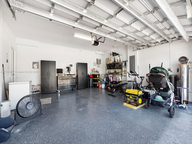 garage with gas water heater, electric panel, a garage door opener, and white fridge