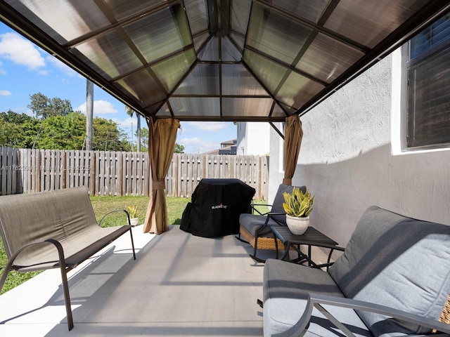 view of patio / terrace with a gazebo and fence