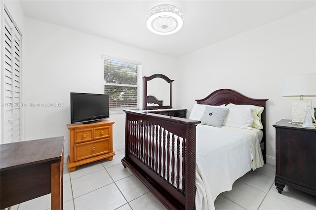 bedroom featuring light tile patterned floors