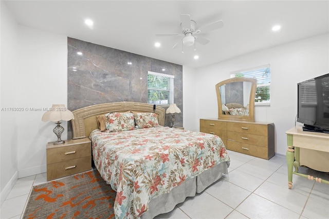 bedroom with light tile patterned floors, baseboards, a ceiling fan, and recessed lighting