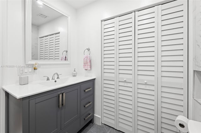 bathroom featuring visible vents and vanity