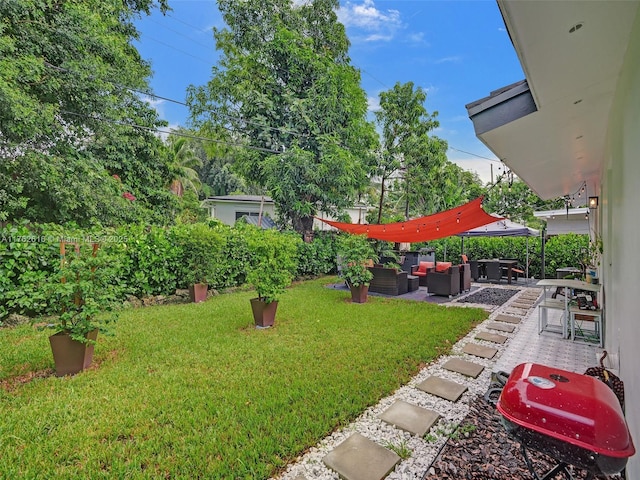 view of yard with a patio area and an outdoor hangout area