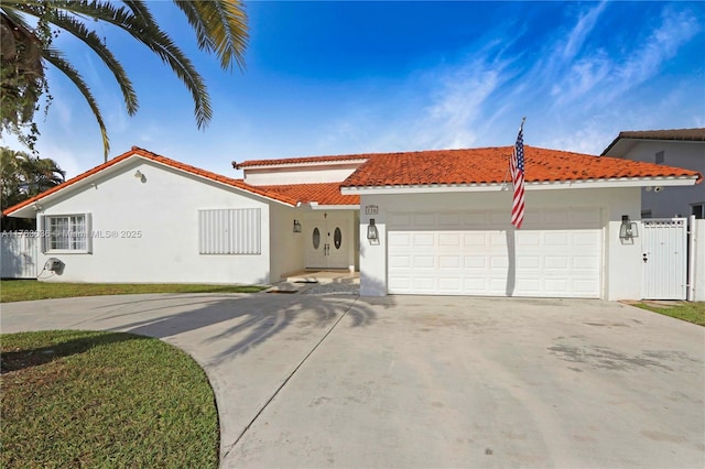116 SW 135th Ave, Miami, FL 33184 - view of front of home featuring concrete driveway, stucco siding, fence, an attached garage, and a tiled roof