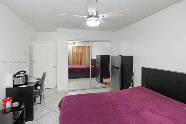 116 SW 135th Ave, Miami, FL 33184 - living area with a textured ceiling, ceiling fan, and light tile patterned floors