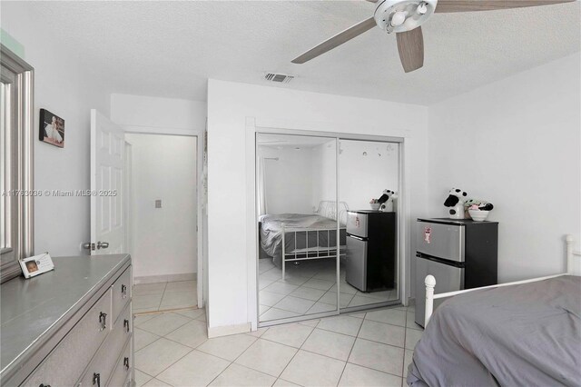 116 SW 135th Ave, Miami, FL 33184 - hall with light tile patterned flooring, a textured wall, and crown molding
