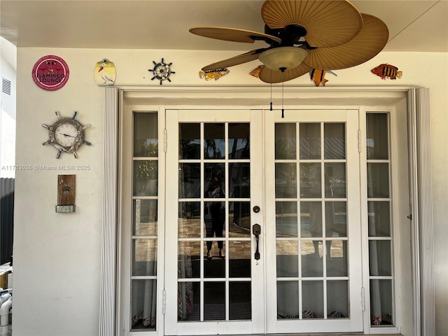 doorway to property with visible vents and french doors