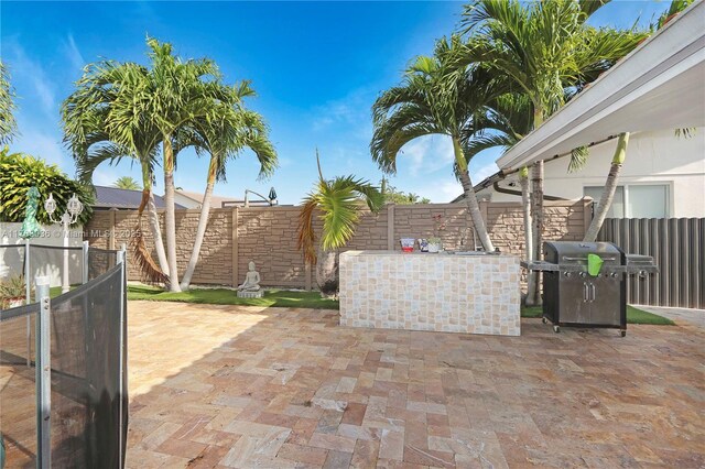 116 SW 135th Ave, Miami, FL 33184 - view of swimming pool featuring a fenced backyard, a fenced in pool, and a patio area