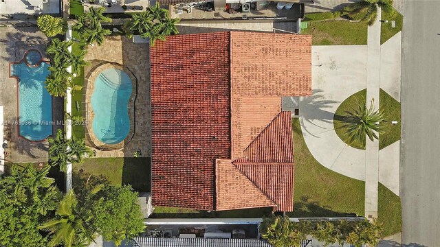 116 SW 135th Ave, Miami, FL 33184 - view of home's exterior featuring a fenced backyard, stucco siding, central air condition unit, and a patio