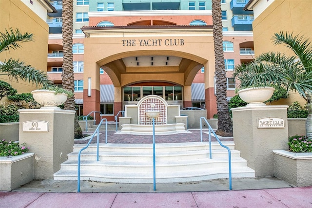 property entrance featuring stucco siding